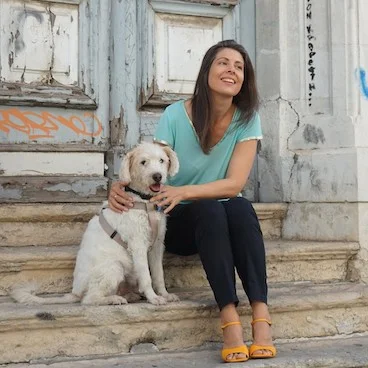 author with her dog